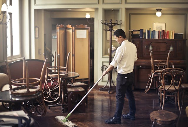 A professional maid giving cleaning advice.