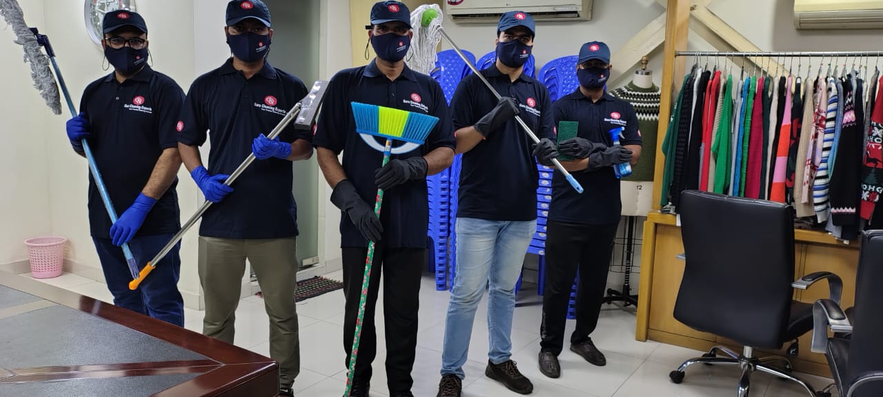 Guru team clearing items from a property.